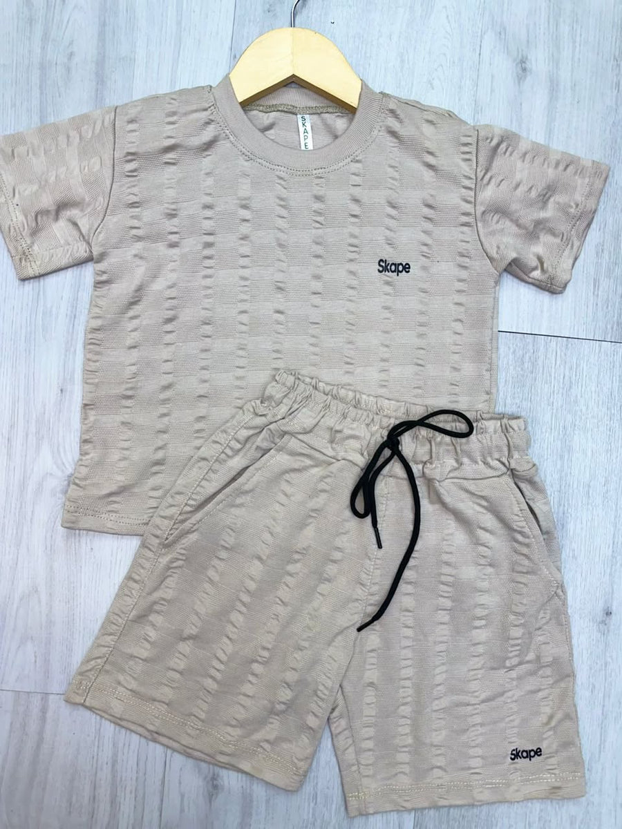 Conjunto deportivo para niño color beige