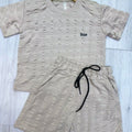 Conjunto deportivo para niño color beige