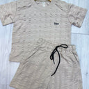 Conjunto deportivo para niño color beige