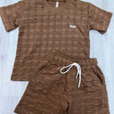 Conjunto deportivo para niño color marrón